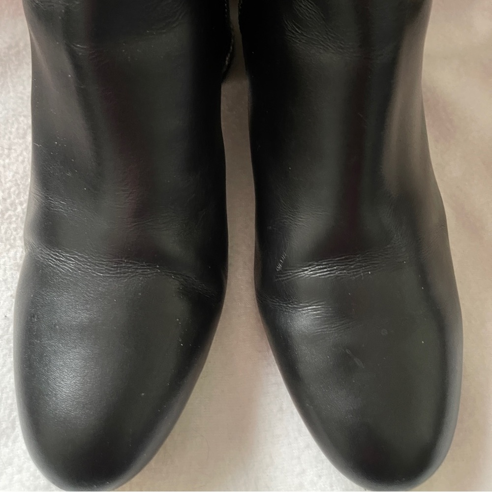 Women’s Michael Kors Leather Booties.  Silver Zipper with chain around heel.